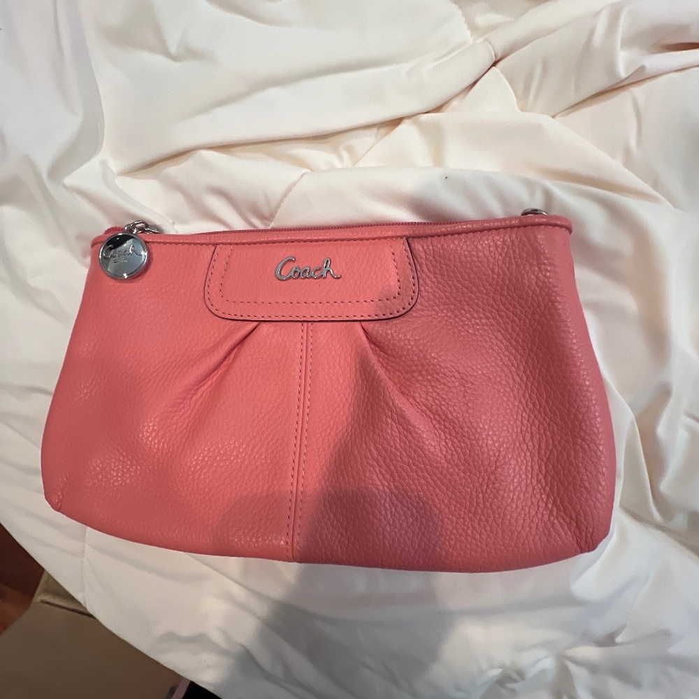 Coach clutch with strap